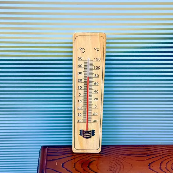 wooden thermometer with temperature scale for indoor use