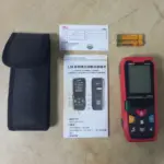 UNI-T LM-100 handheld laser distance meter with case, manual and batteries for 100m accurate measurement