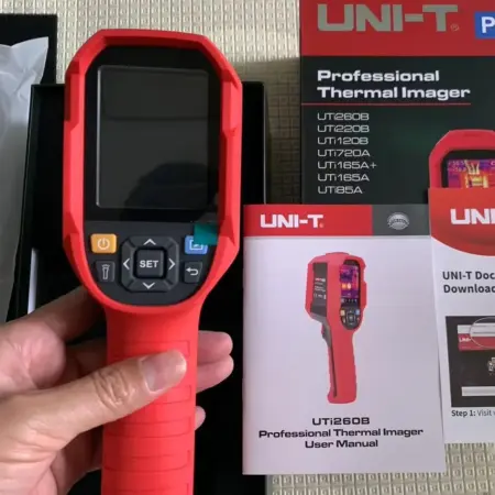 UNI-T UTi260B thermal imaging camera showing heat pattern on screen
