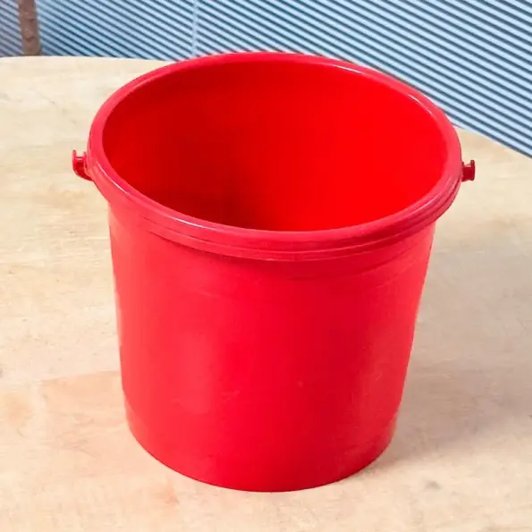 5 liter red plastic bucket with handle for household and cleaning use in Bangladesh
