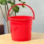12 liter red plastic bucket with strong handle for household and cleaning use in Bangladesh