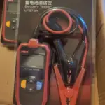UNI-T UT673A digital battery tester with clamp cables for car battery testing