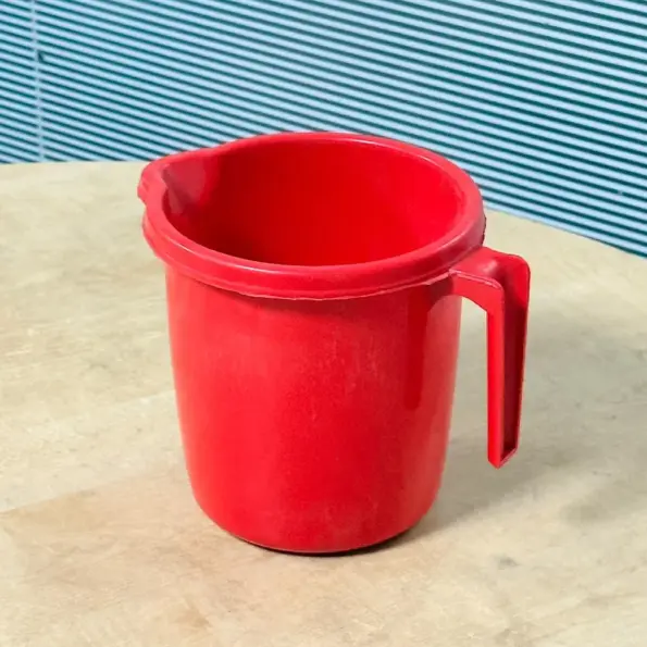 red plastic mouge jug 2.5L with handle and pouring spout for daily kitchen use in Bangladesh