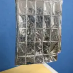 Reflective aluminum foil insulation blanket measurement with measuring tape